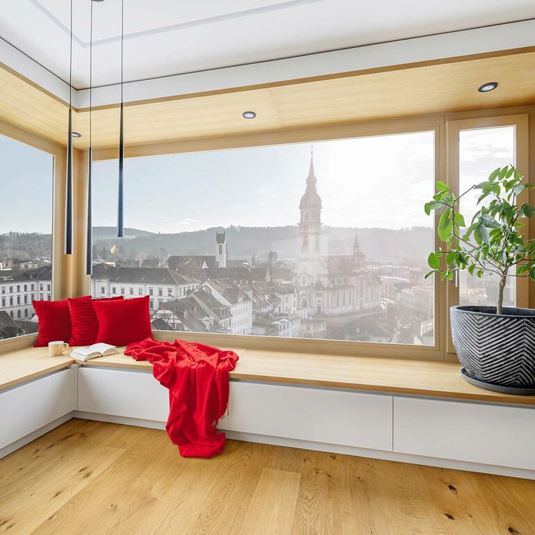 Symbolbild behagliche Wärme auf der Fensterbank.